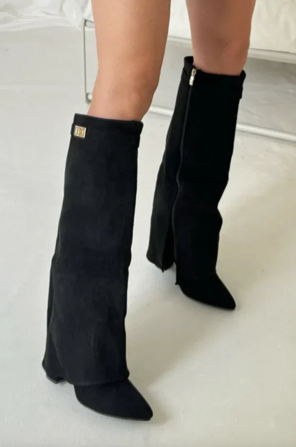 Women's boots with block heels and an elegant fit, featuring buckles in suede or leather